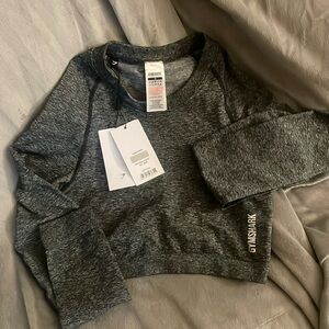 Gymshark Adapt Seamless LS crop top Black, size Medium